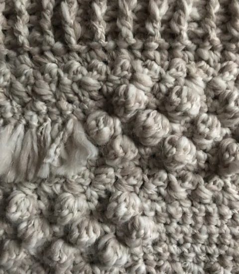 Wandhanger Nop ecru melee